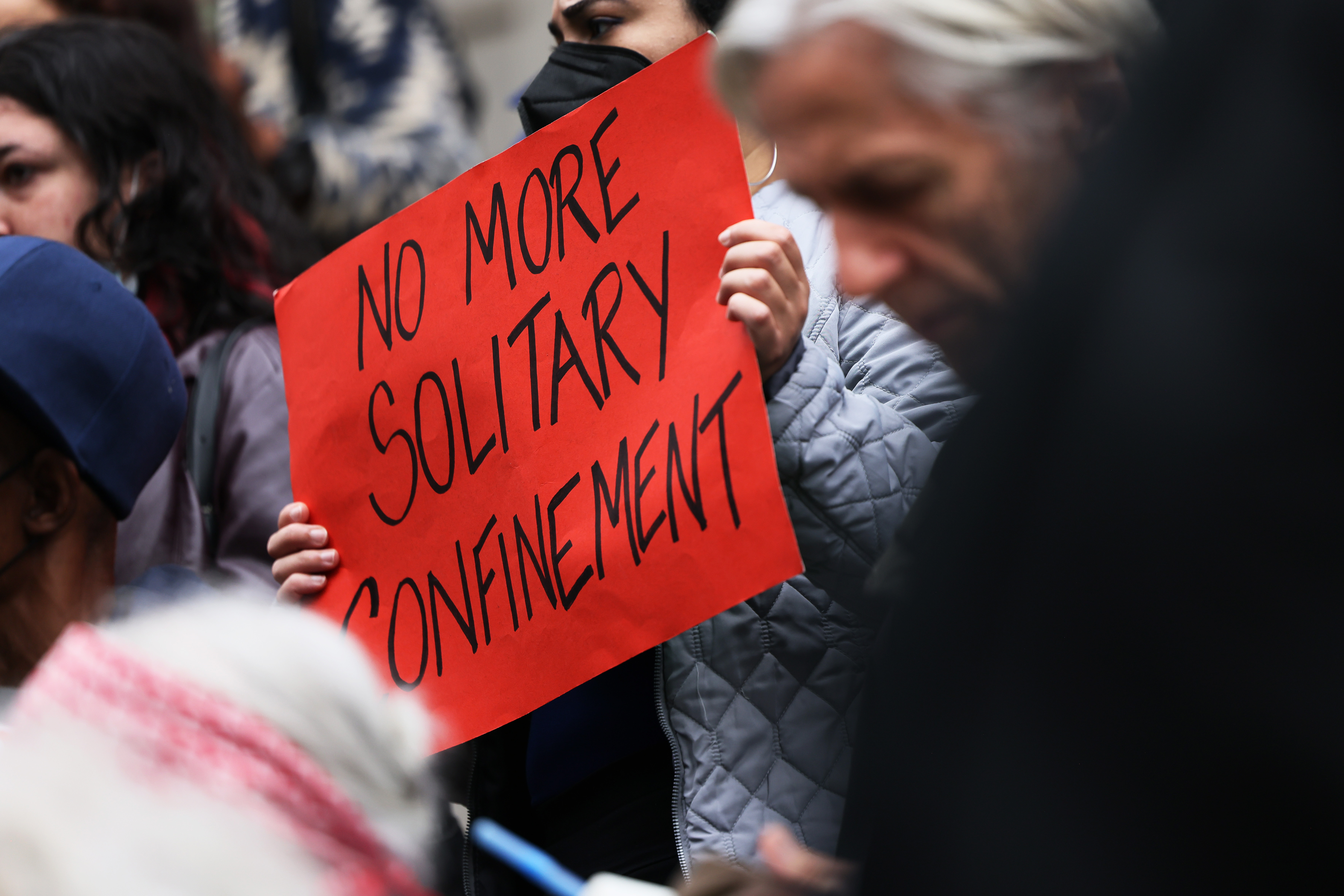 Activists demonstrate against conditions at Rikers Island jail.