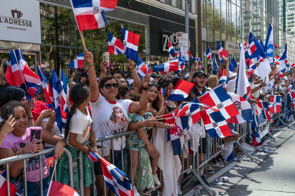People celebrate at the Dominican Day Parade in Manhattan on Aug. 13, 2023.