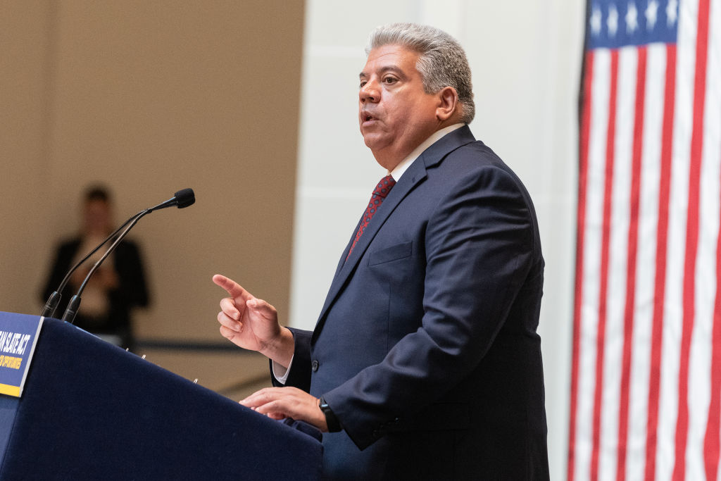 Brooklyn District Attorney Eric Gonzalez speaks at Gov. Kathy Hochul's signing of the Clean Slate Act at the Brooklyn Museum on Nov. 16, 2023.