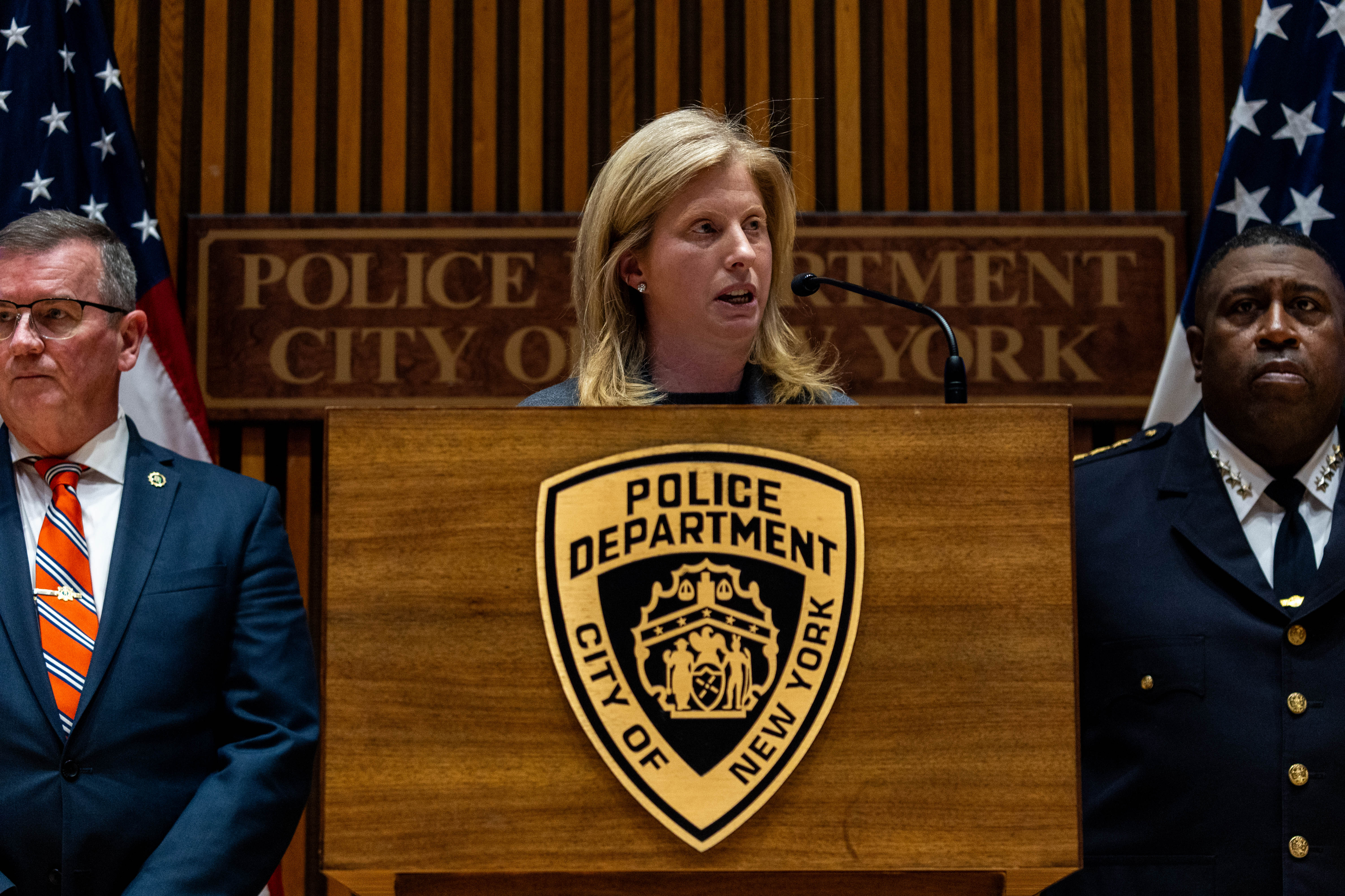 Commissioner Jessica Tisch speaks at a podium.