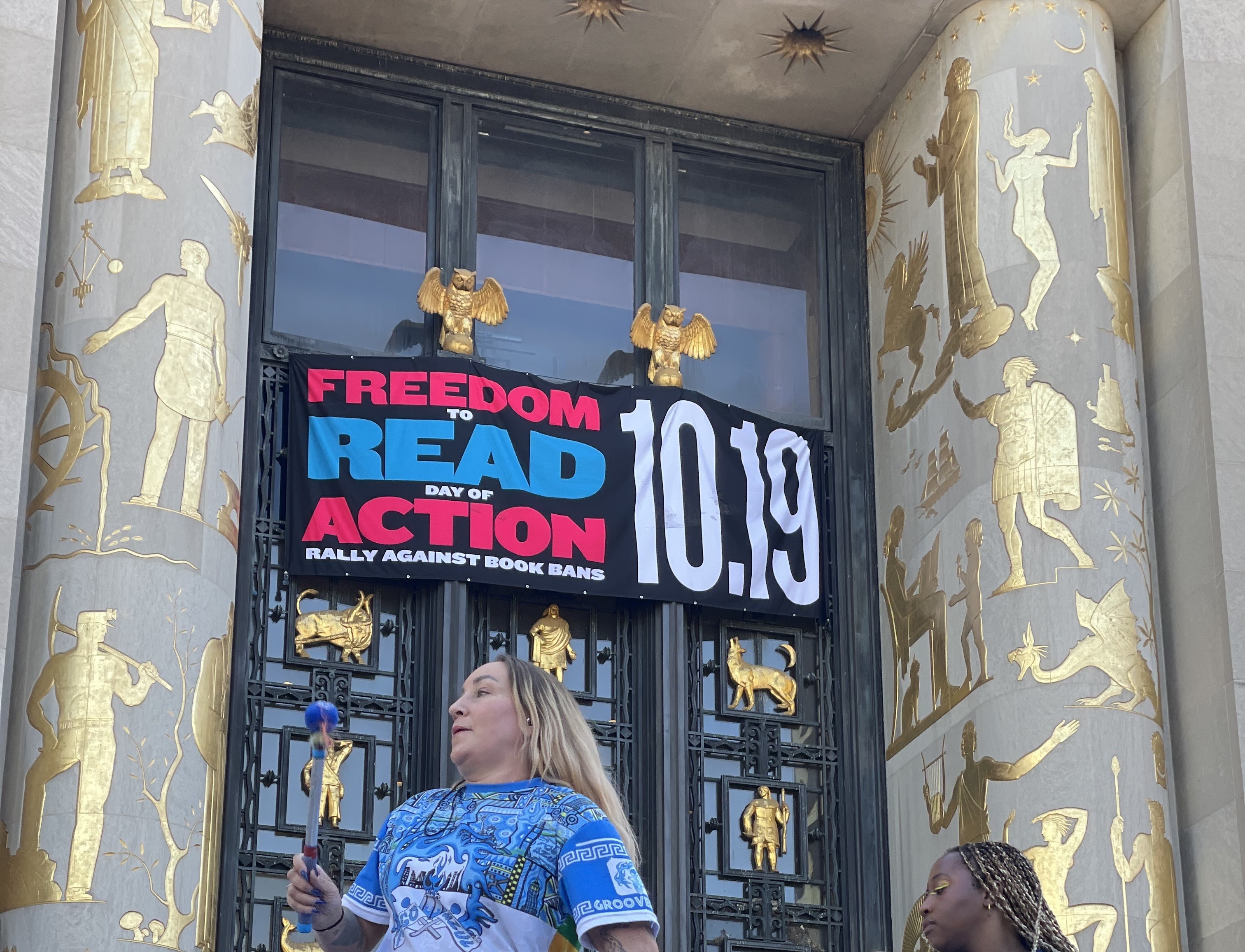 A banner hangs over an entryway.