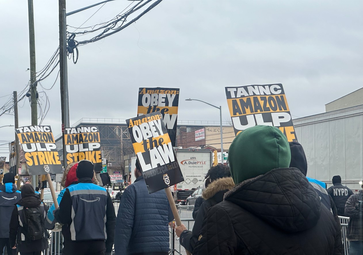Amazon workers picket outside the company's fulfillment center in Maspeth, Queens, on Dec. 20, 2024.
