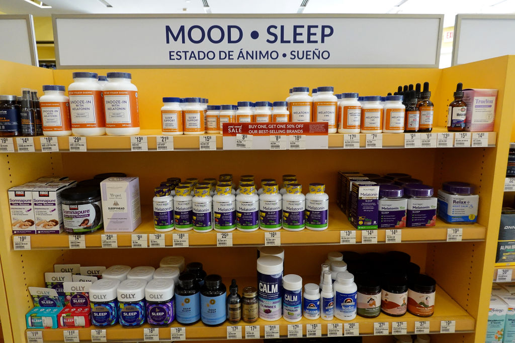 a shelf of melatonin gummies