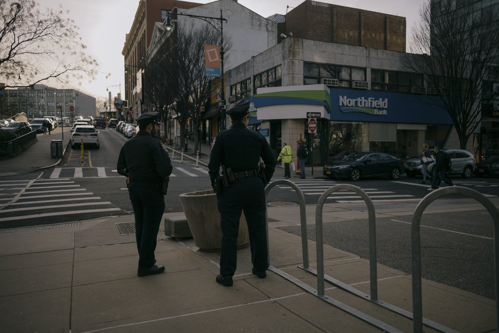 Two NYPD officers stand outside the Richmond County Clerk in Staten Island on March 8, 2024.