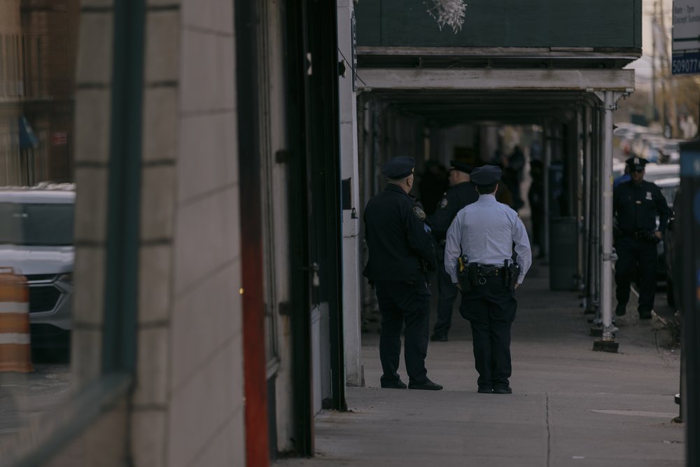 NYPD officers are seen on the street in Staten Island on March 8, 2024.