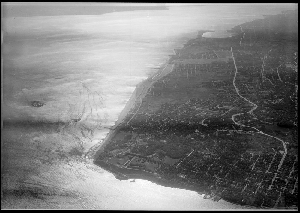 Oblique view looking south showing the South Beach project Fort Wadsworth to Great Kills Park, Hoffman Island at left. (Photo courtesy of the New York City Municipal Archives)