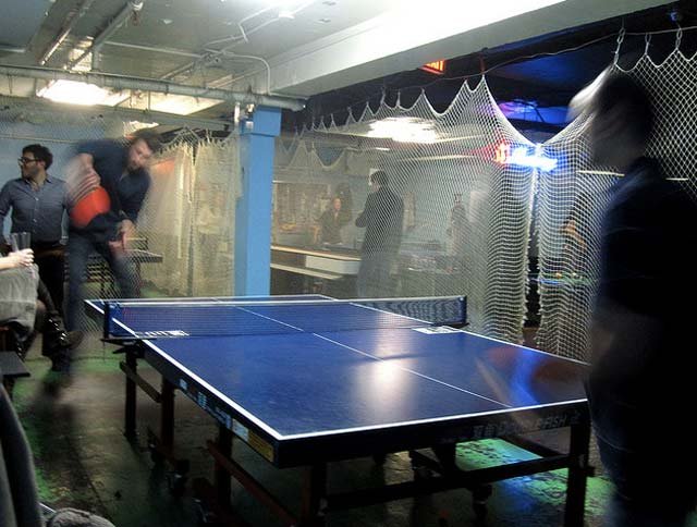 030711fatcat.jpg Flickr user kittenclawFat Cat: For sheer quantity, Fat Cat has to be the city's mecca for drinking and playing. Boasting 10 pool tables, 10 ping pong tables, three shuffleboard tables, three foosball tables and tons of chess and checkerboards, the Christopher Street bar is good for anyone looking to join a tournament or just get drunk and smack ping pong balls toward their friends. Ping pong, pool and shuffleboard is nine cents per person per minute (jumping to 11 cents on Friday and Saturday), and foosball is $1 per game. Of course they're beer and wine only, though they recently added some Soju cocktails. 75 Christopher Street, (212) 675-6056