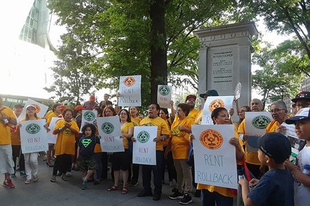 Tenants rally for rent freezes and rent roll-backs before a meeting of the Rent Guidelines Board in 2018.