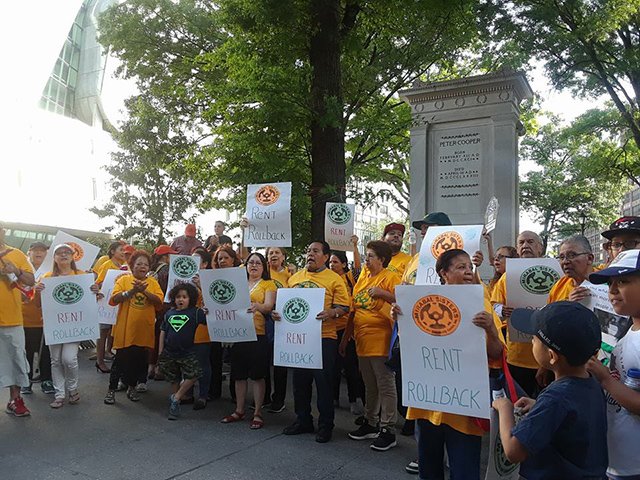 Tenants rally for rent freezes and rent roll-backs before a meeting of the Rent Guidelines Board in 2018.