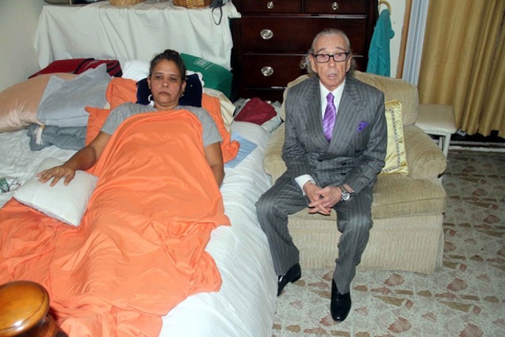 0410904e7lawsuit-4-jpeg.jpeg Attorney Sanford Rubenstein sits with his client Irene Urena Perez, 46, who was shot by a police officer on December 5. (Photo by David Greene / Gothamist)