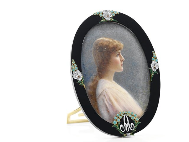 041812_jewels2.jpg An Art Deco onyx, diamond, and multi-gem frame, by Cartier. Estimate: $5,000 - $7,000; Sold: $74,500 (Portrait of Huguette's sister Andrée not included)