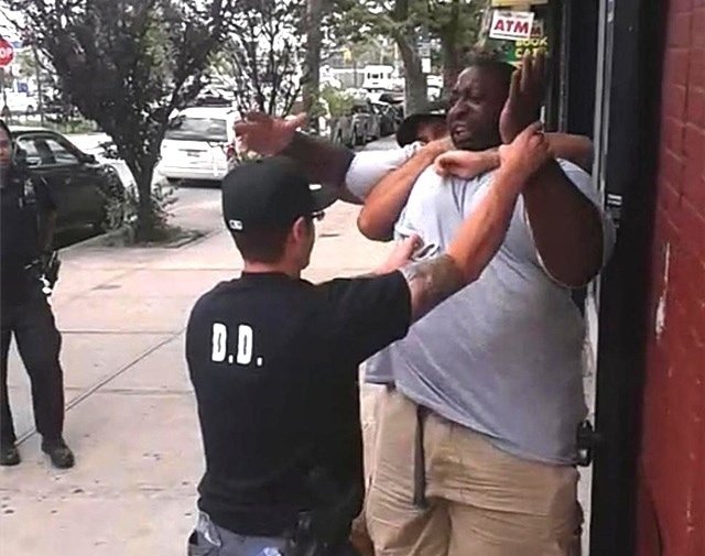 Video taken of the arrest that preceded Eric Garner's death shows what one top NYPD official described as a chokehold during testimony on Tuesday.
