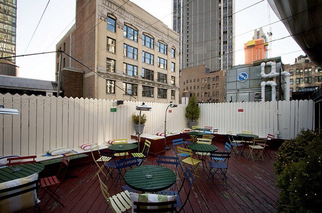 052011mebar.jpg Ultraclay's FlickrMe Bar: Here's less swank roof option to make up for all the bourgy ones we've included here. Located right under the chin of The Empire State Building on the roof of the budget La Quinta in, this festive roof bar features nice views, a diverse crowd, and reasonably priced drinks. There's no food at Me Bar, but guests are encouraged to bring their own or order delivery from their selection of takeout menus. On Saturday they'll be celebrating the end of the world ("wait for it... wait for it..."), and the invitation from whoever is promoting the party reads, "The Rapture is supposed to start at 6 p.m. with an earthquake in EACH TIME ZONE. How exciting! Get to the roof at 5:30 so we can watch people fly into the sky."17 West 32nd Street, (212) 290-2460