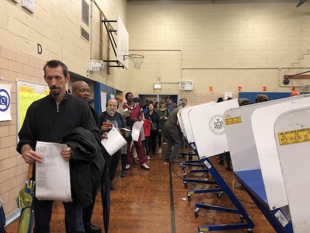 Voters waited in line to scan their ballots at a polling site in Clinton Hill Brooklyn on Election Day in 2018.