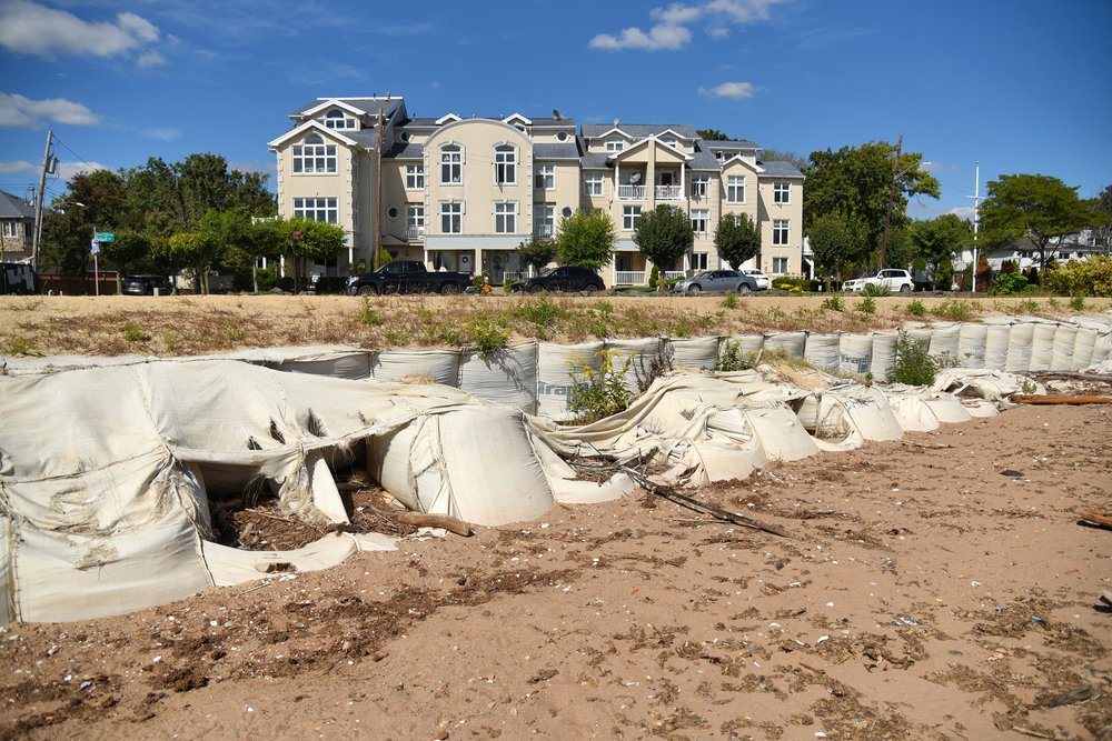 A temporary coastal barrier placed along the coast of Tottenville in Staten Island in the aftermath of Hurricane Sandy has burst open. Photo taken September 29, 2022