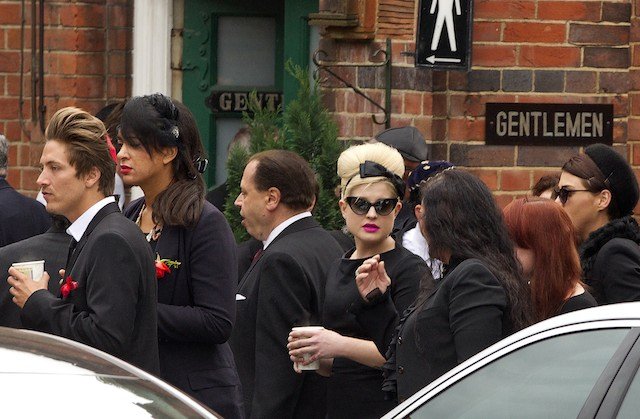 072611winehouse2.jpg Kelly Osbourne outside the site of the funeral