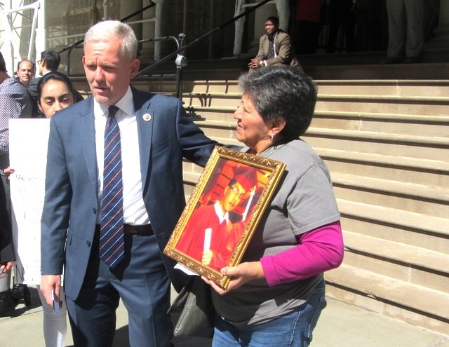 Councilmember Jimmy Van Bramer and Marta Puruncajas, whose son was killed by a hit and run driver who remains at large.
