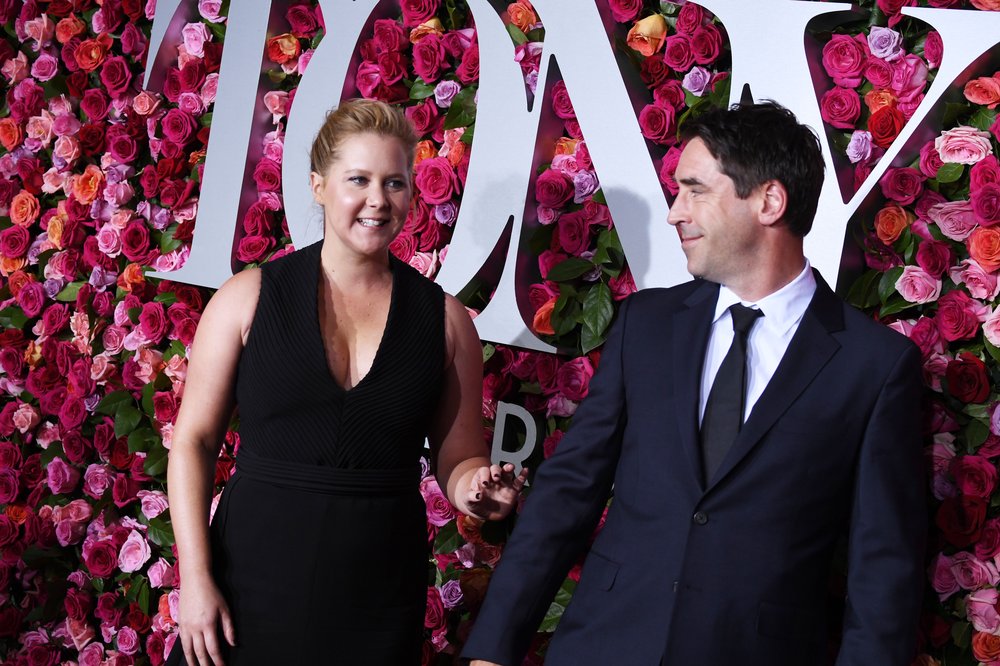 09e882d0cshutterstock_9708048dd-jpg.jpeg Amy Schumer and Chris Fischer on the red carpet<br>(Stephen Lovekin/Variety/REX/Shutterstock)