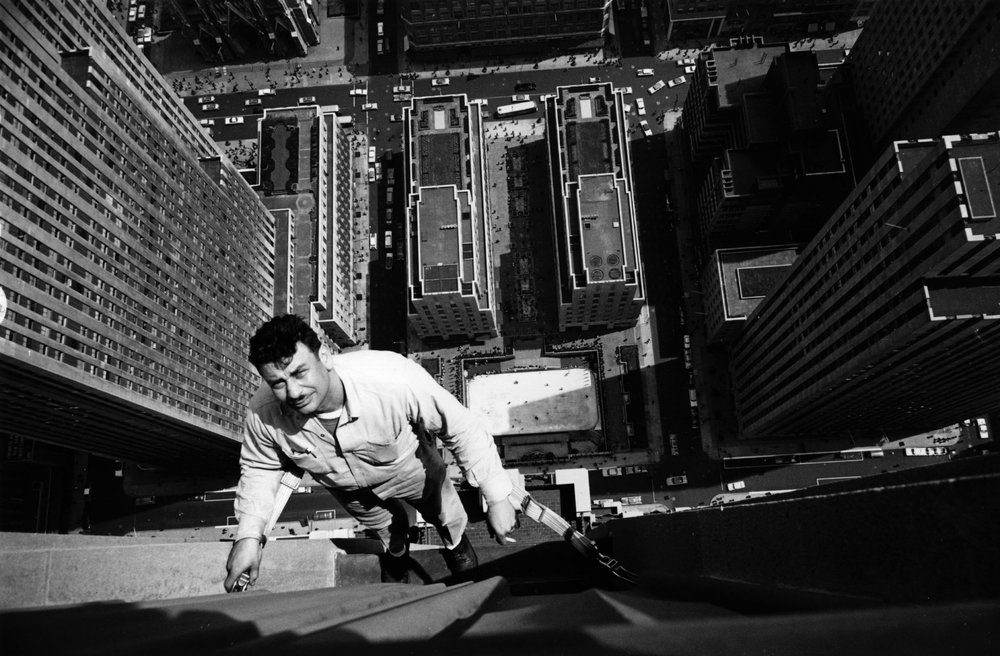 0afb30b1a.jpeg "A window cleaner at work on the RCA Building, Rockefeller Center. May 1961."