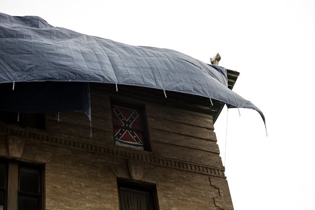 0b968167b081917eastvillageconfederateflagtarp-jpg.jpeg