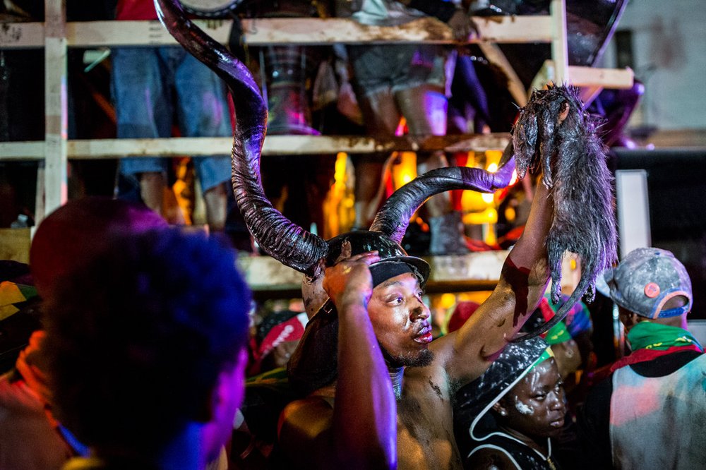 0c3fd9541ebe6be4c9090516jouvert-16-jpg-web_gallery-jpeg.jpeg A reveler playing Jab Jab holds the carcass of an opossum at J'Ouvert 2016.