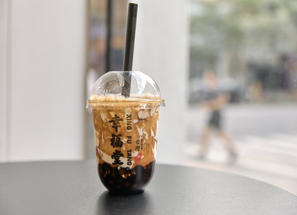 Tiny boba pearls in a drink.