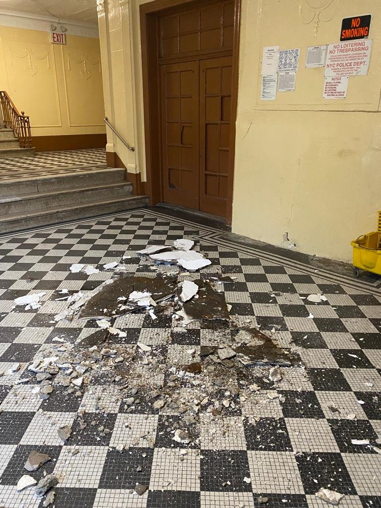 Crumbling ceiling in the lobby at 1018 Eastern Parkway.