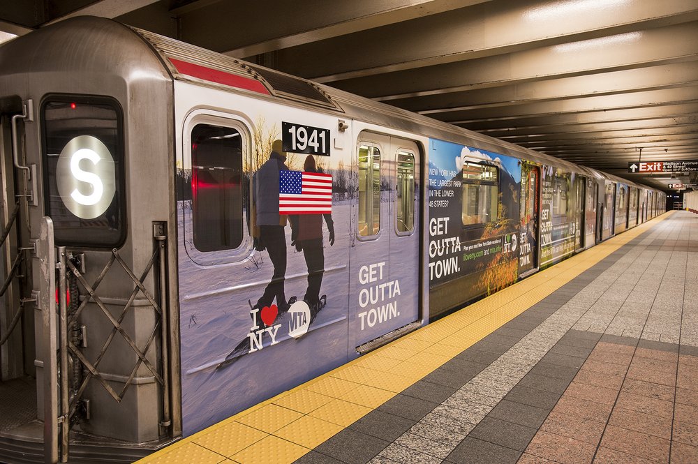 A subway train in a station.