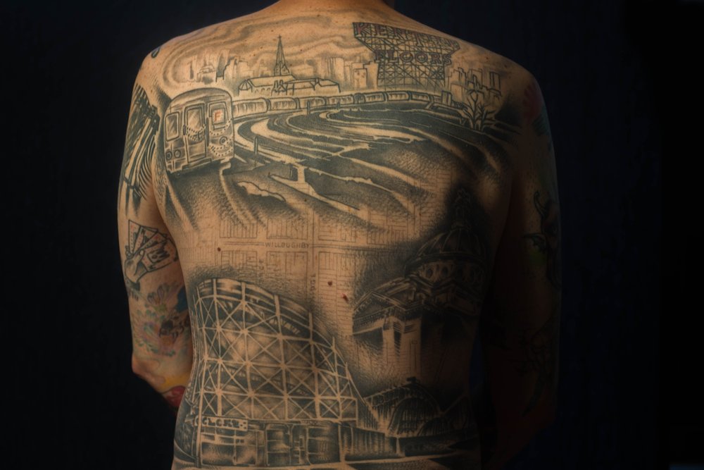 109dbc94cdyte-8-jpg.jpeg David Dyte, originally from Melbourne, got a back piece with the F train, Kentile Floor sign, Cyclone roller coaster and the Williamsburg bank building. The piece, tattooed by Kati Vaughn, also includes historical city maps of his neighborhood, Downtown Brooklyn.<br>