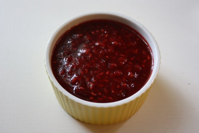 Raspberry-Chipotle JamLike the figs from the previous slide, this recipe couldn't be simpler to make. Assemble ingredients, dump into pot, try not to burn it, serve. The sweet, tart raspberries are the perfect foil to the smokey, spicy chipotle peppers; this isn't your grandmas jam (unless your grandma was rad and loved spicy food).Ingredients     (Nell Casey/Gothamist) 6 ounces fresh raspberries1/2 cup granulated sugar1/3 cup water1/2 or 1 full chipotle chile pepper in adobo (I used a full chile plus some of the juice but I'm a spice freak)pinch kosher saltlemon zest (optional)Combine all the ingredients in a small saucepan over medium-low heat. Cook, stirring frequently, until thickened and syrupy. Transfer to a serving vessel and top with lemon zest.Like I said, pretty simple, eh?