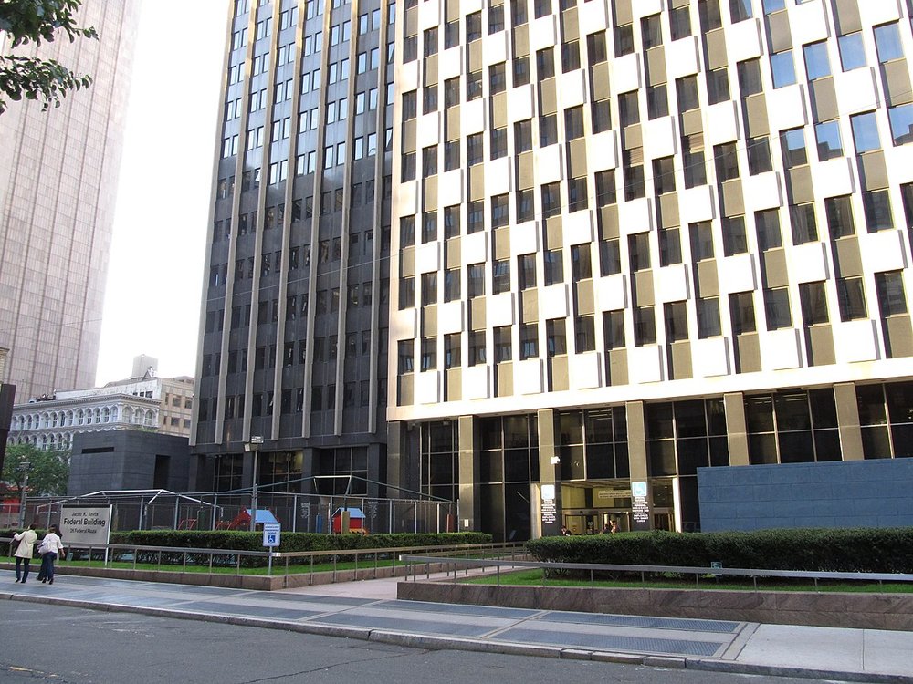 An exterior photo of the Jacob Javits Federal Building in Manhattan.