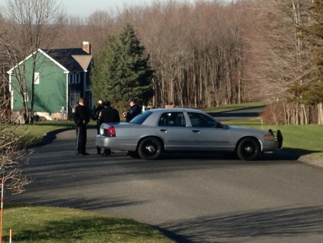 Police outside the shooter's home in Connecticut
