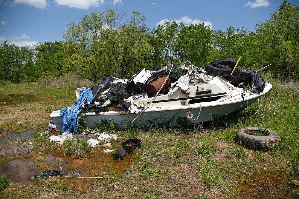 An abandoned boat, filled with debris, is one of the only remnants left by human visitors to the proposed site of the Arthur Kill Terminal.