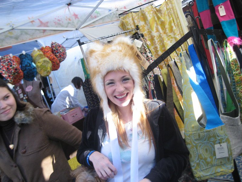 A woman with a furry hat.