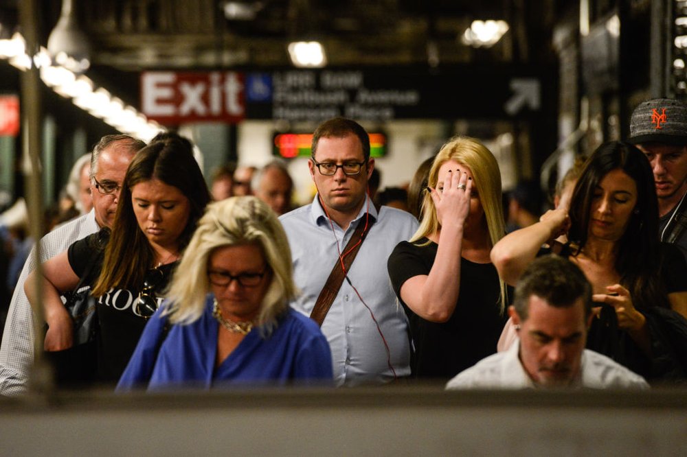 15806d6cdgettyimages-811892860-jpg.jpeg Commuters transfer from Long Island railroad service to a New York City subway at the Barclays Center subway station on July 10, 2017 (Getty Images)