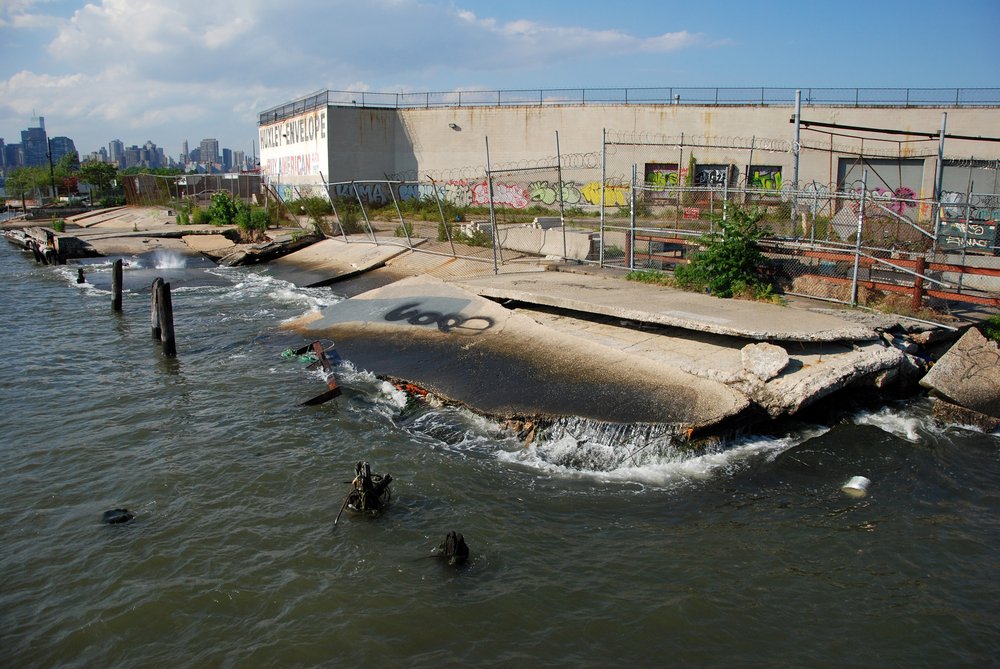 The Huxley Envelope warehouse at the foot of Huron and India Street, photographed in 2013. The abandoned waterfront piers here were a popular destination for local residents.