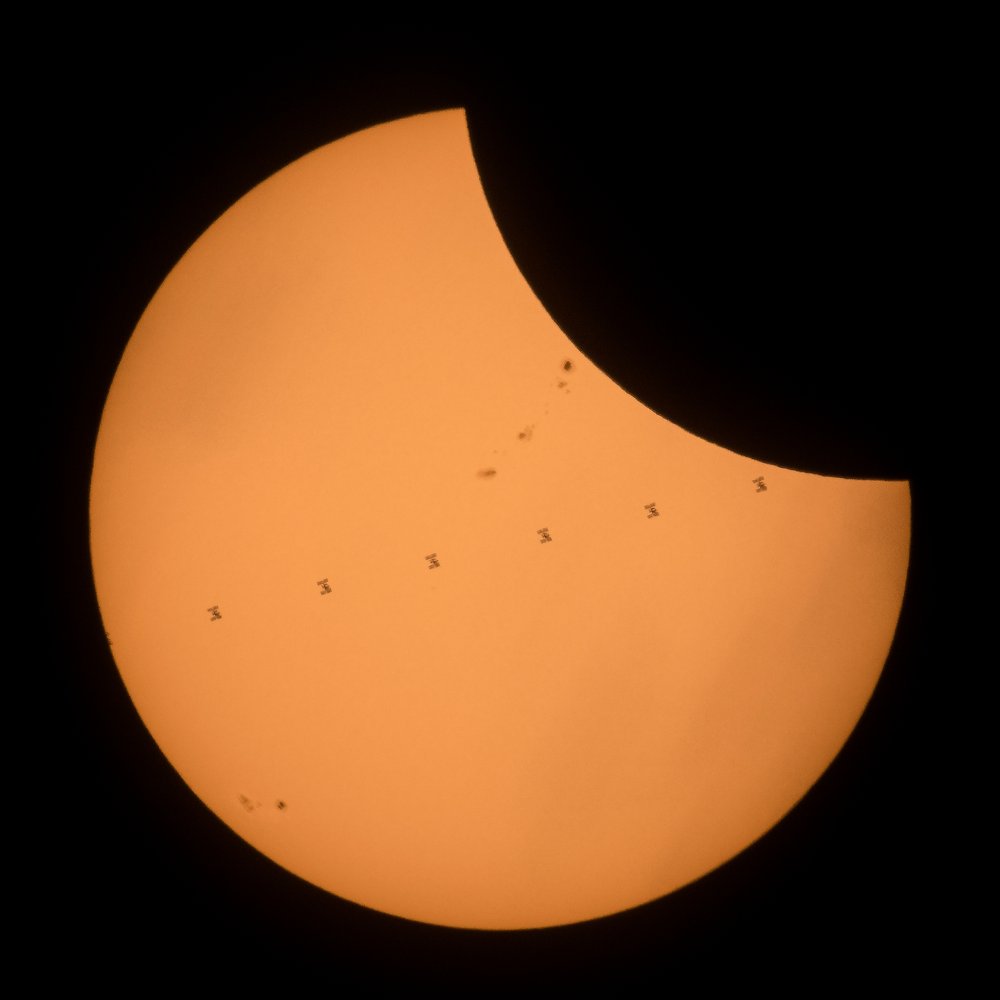 168600e2f082217moon7-jpg.jpeg This composite image, made from seven frames, shows the International Space Station, with a crew of six onboard, as it transits the Sun at roughly five miles per second during a partial solar eclipse, Monday, Aug. 21, 2017 near Banner, Wyoming.