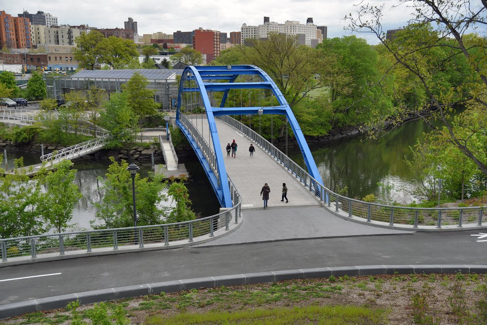 A third pedestrian bridge, crossing over the Bronx River to a larger section of Starlight Park that was completed in 2013.