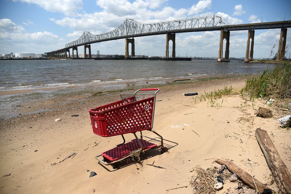 An abandoned shopping cart on the beach. The proposed site of the Arthur Kill Terminals is located immediately adjacent to the Outerbridge Crossing.