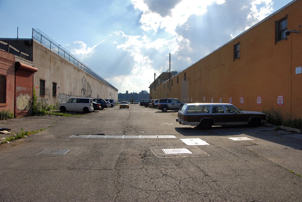 Huron Street, photographed in 2013, when it was still lined with one story warehouses. The Huxley Envelope site was located at the dead end of this street.