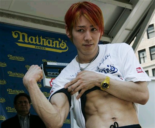 Kobayashi showed off his gun AND six-pack.