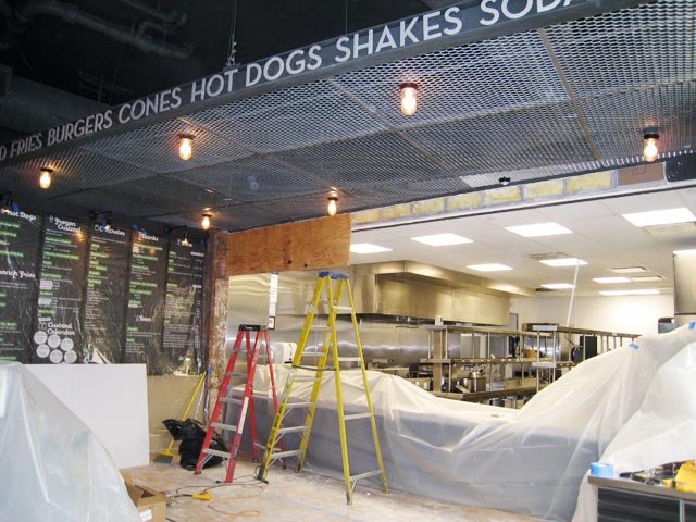2008_10_shack3.jpg Some interior work is still being done in the register/line area. The kitchen is the entire size of the Madison Square Park shack, so they expect lines to move much faster.