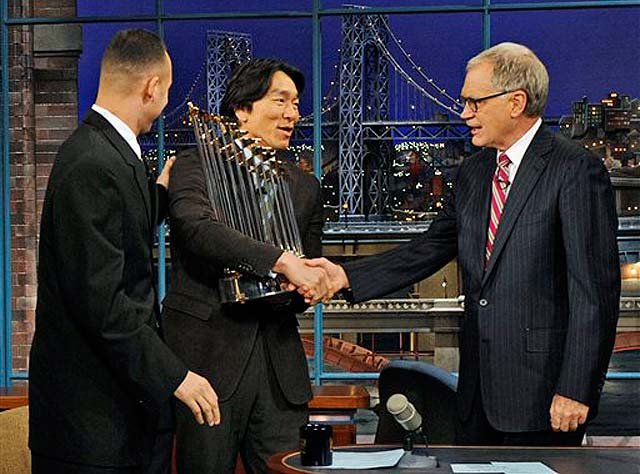 David Letterman congratulates Hideki Matsui with Derek Jeter looking on