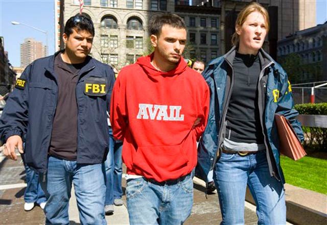 Federal agents escort Sal Anastasio, center, from Federal Plaza