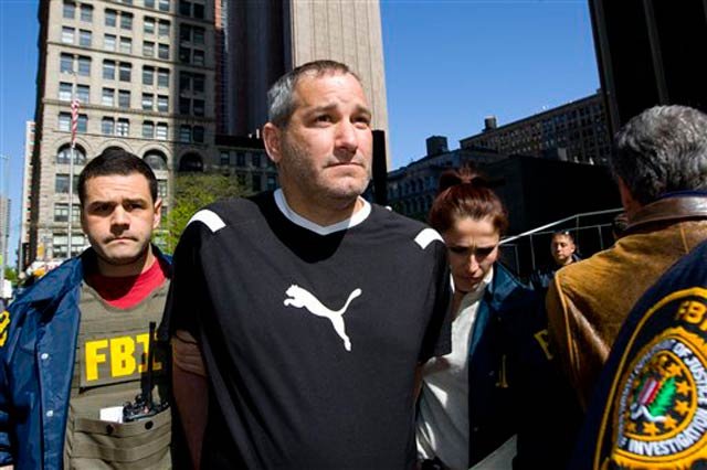 Federal agents escort Anthony Vechoione, a reputed member of the Gambino organized crime family, from Federal Plaza