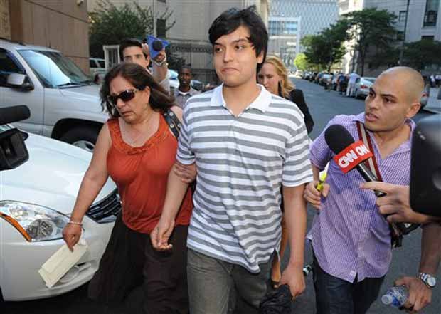 Son of accused spies Juan Lazaro and Vicky Peleaz, Juan Jose Lazaro, center, and Peleaz's sister, Raquel Pelaez Ocampo, left.