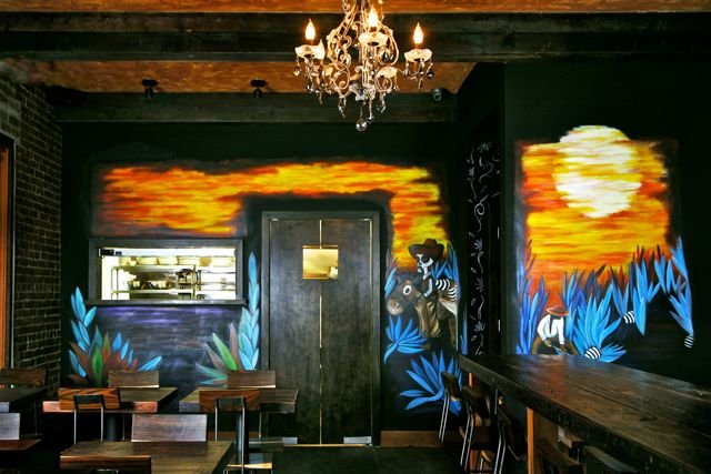 The mural in the back. 