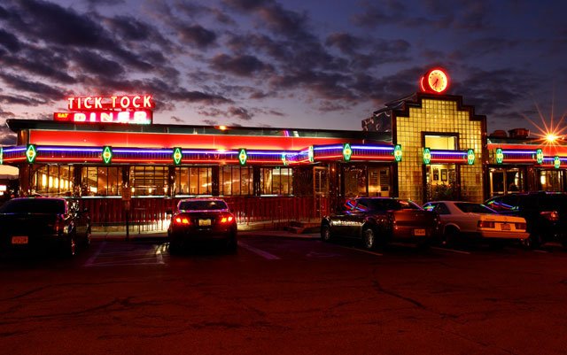 Top, image of the diner from the Tick Tock Diner website; below, George appeared on Diners, Drive-ins and Dives with Guy Fieri