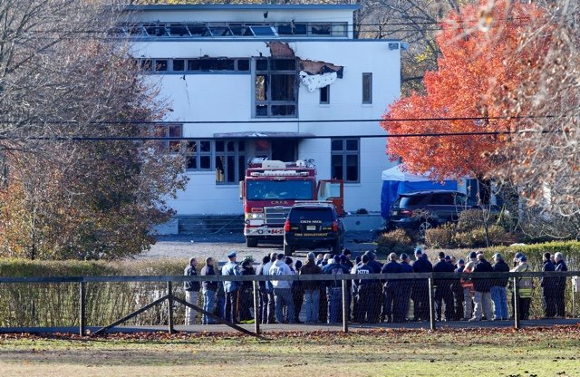 Investigators outside Keith and Jennifer Caneiro's home on November 21