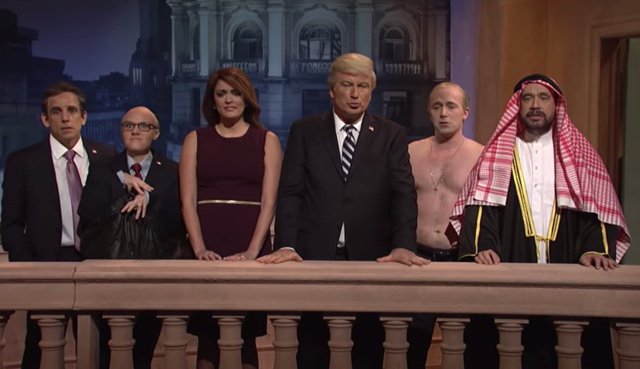 2018_11_snlcf_trump.jpg From left: Michael Cohen, Rudy Giuliani, Melania Trump, Donald Trump, Vladimir Putin, and Mohammed bin Salman